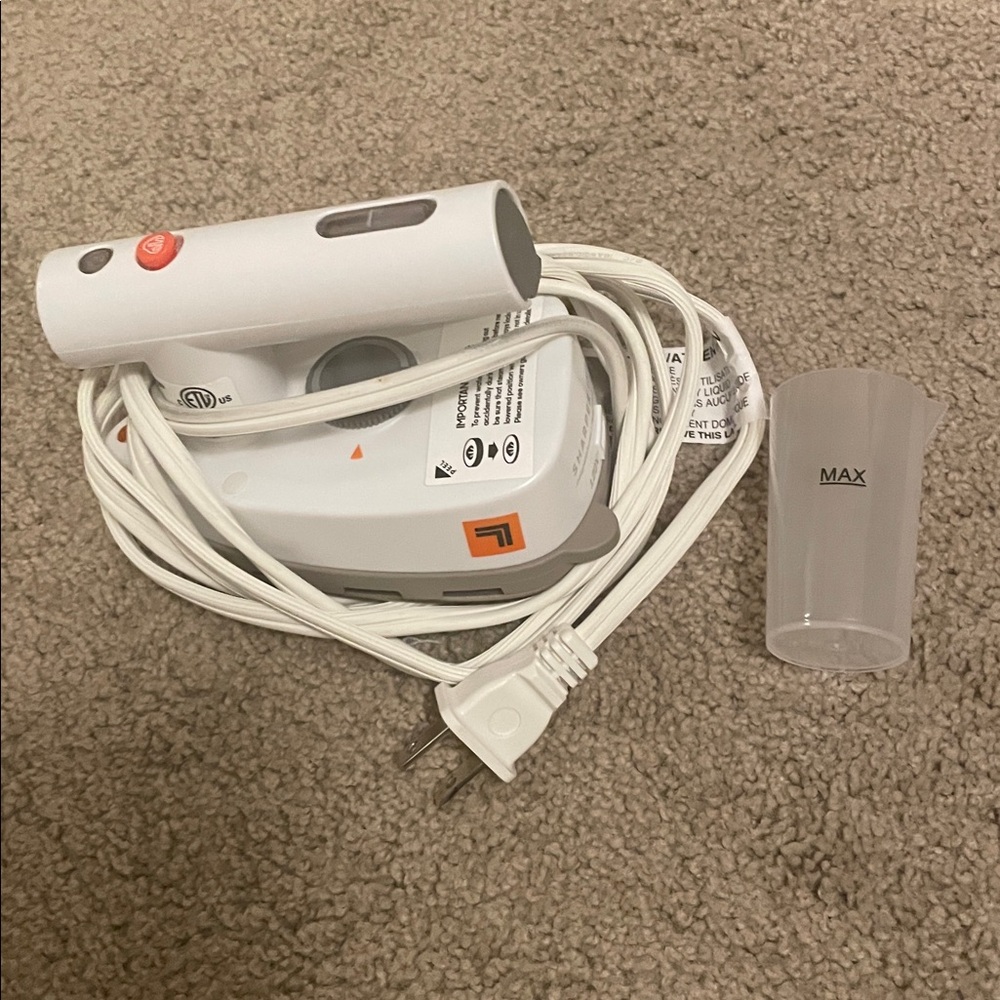 Sharper Image Handheld Mini Steam Iron - White corded